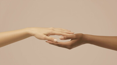 Two hands connecting. Everything is interconnected